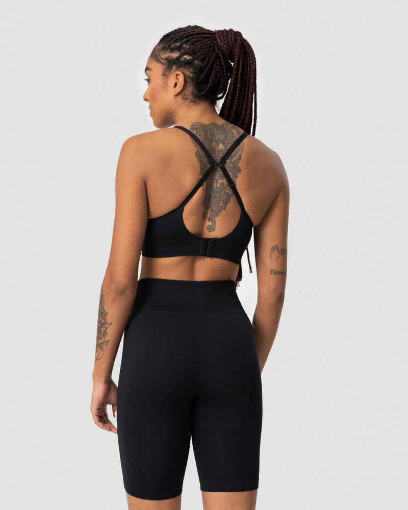 define adjustable sports bra black