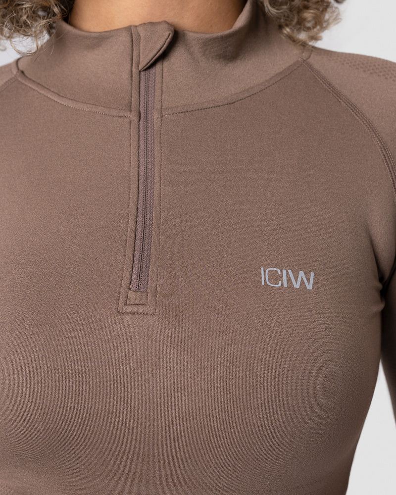 define cropped 1/4 zip desert sand