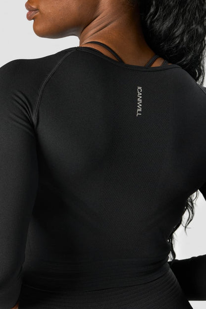 define seamless ls crop top black wmn